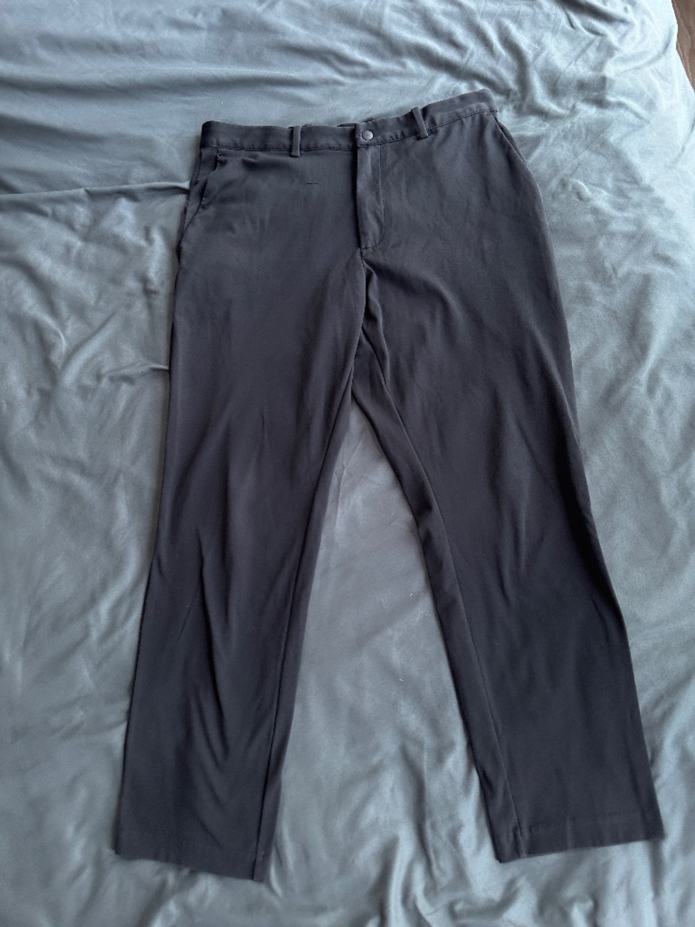 Uniqlo black stretchy trousers, waist 30-33"